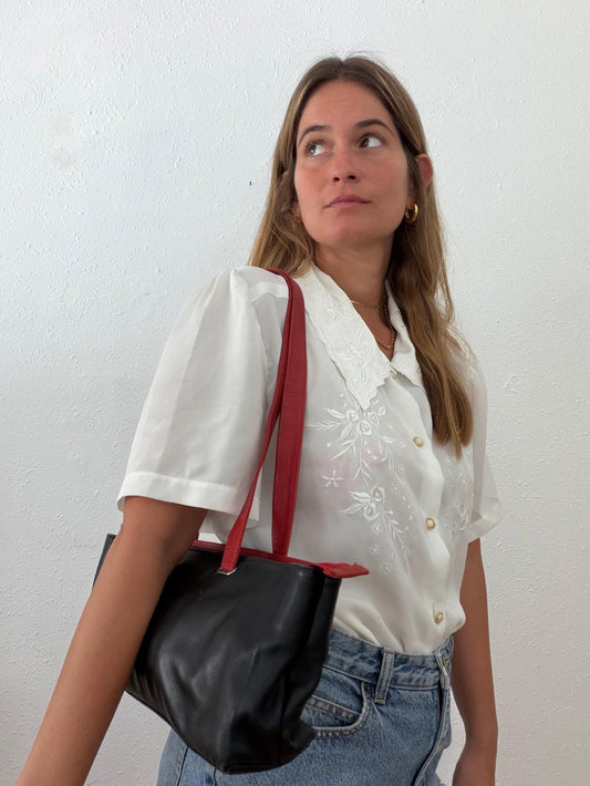 תיק וינטג עור שחור רצועות אדומות